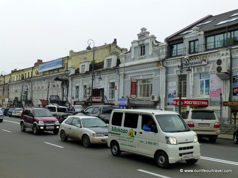 Japanese cars and Asian buildings - does not resemble Russia. Vladivostok.