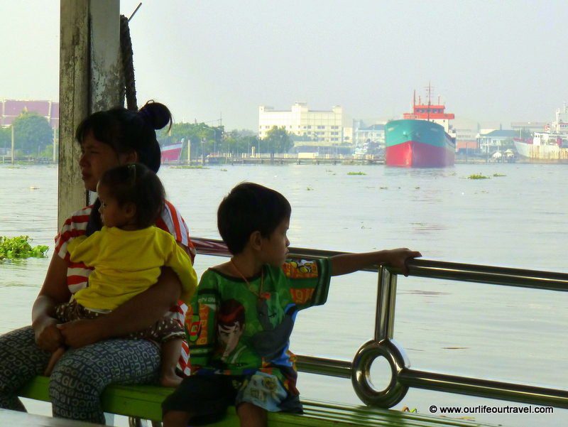 Taking the local ferry near Bangkok.