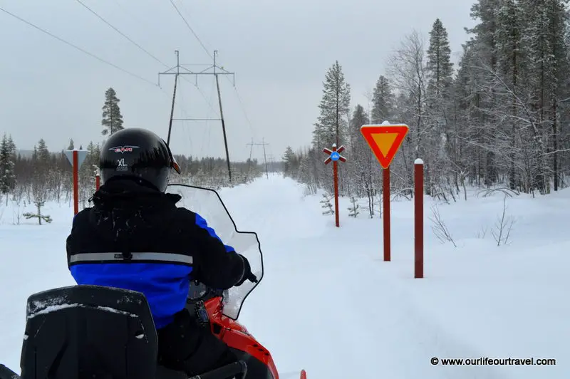Riding a snowmobile around Levi, Finland - Finland itinerary winter